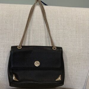 Chic Black Leather Shoulder Bag with Gold Chain